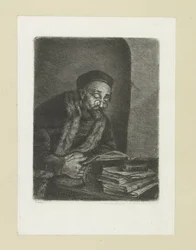 Mann hinter einem Schreibtisch