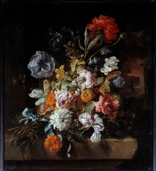 Blumenstrauß auf einer Steinbank