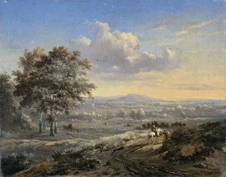 Hügelige Landschaft mit einem Reiter auf einer Landstraße