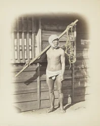 Mann mit Fischkorb