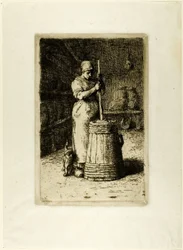 Eine Frau beim Buttern