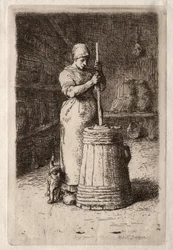 Eine Frau beim Buttern