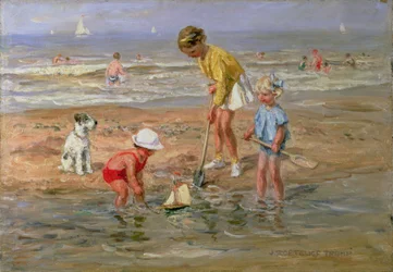 Kinder spielen am Strand