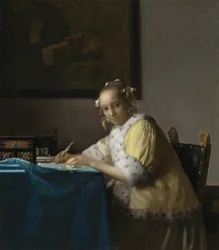 Eine Dame beim Schreiben