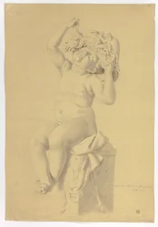 Antike Statue eines sitzenden Putto, der eine Maske des Silenus hält