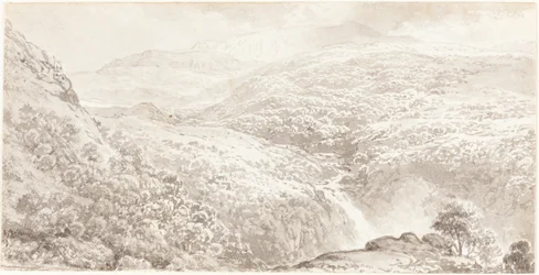 Ein Bergtal mit einem Wasserfall