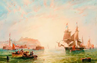 Ein Handelsschiff und andere Schiffe vor dem Eingang nach Scarborough