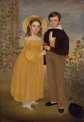 Ein Junge und ein Mädchen in einem Garten