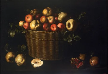 Korb mit Äpfeln, Quitten und Granatäpfeln
