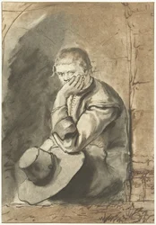 Sitzender Mann
