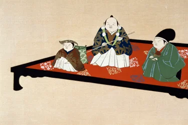 Japanische Familie im Innenraum