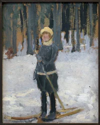 Frau beim Skifahren im Wald