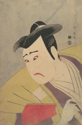 Der Schauspieler Ichikawa Yaozo III hält einen roten Fächer, 1794