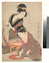 Frauen bei der Zubereitung von Sashimi