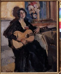 Frau mit einer Gitarre