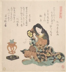 Frau, die die Tsuzumi spielt