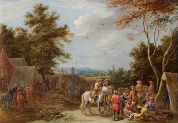 Ein Lager mit Soldaten, die Karten spielen