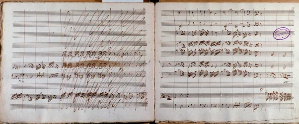 Doppelseite, signiert vom Autor der Partitur für das Konzert für Cello und Orchester in Es-Dur von Luigi Boccherini