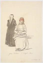 Sitzende alte Frau und eine stehende