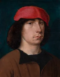 Ein junger Mann mit roter Mütze