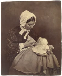 [Paul Nadar an der Brust seiner Amme]