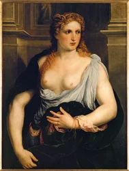 Frau in einem grünen Mantel