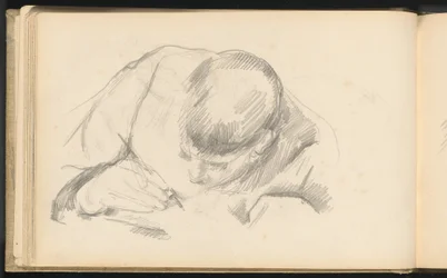 Der Sohn des Künstlers beim Schreiben