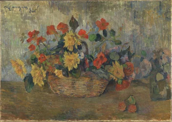 Kapuzinerkresse und Dahlien in einem Korb