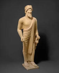 Kalkstein-Statue eines bärtigen Mannes mit Votivgaben, um 475-450 v. Chr. (Kalkstein)
