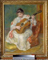 Frau spielt Gitarre
