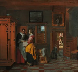 Innenraum mit Frauen neben einem Wäscheschrank