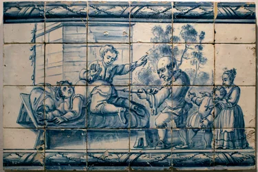 Der Arzt verabreicht einem Patienten einen Einlauf - Satirische Tafel aus Lissabon, erste Hälfte des 18. Jahrhunderts (Arzt - Satirische Tafel, erste Hälfte des 18. Jahrhunderts) - Nationalmuseum für Azulejos, Lissabon (Portugal)