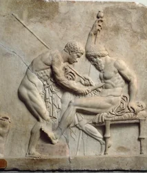 Neuattische Kunst: Relief mit der Darstellung des von einem Chirurgen behandelten Telephos. 1. Jahrhundert v. Chr. Aus Herculaneum. Neapel, Archäologisches Nationalmuseum