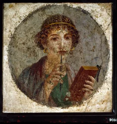 Porträt von Sappho, griechische Dichterin. Römische Frau mit Buch und Stift (Stylus oder Stilus), aus Pompeji, Neapel, Italien