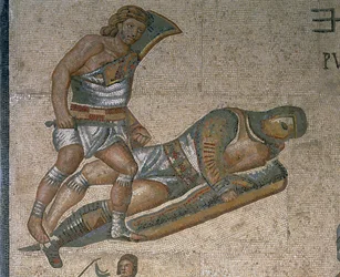 Mosaik mit einer Szene kämpfender Gladiatoren, (Detail) eines Gladiators in Rüstung