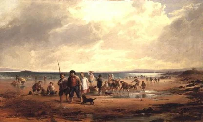 Kinder spielen am Strand