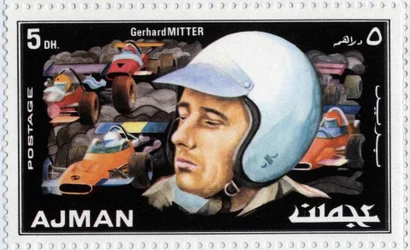 Briefmarke der Arabischen Emirate, die den Rennfahrer Gerhard Mitter darstellt (1935-1969)