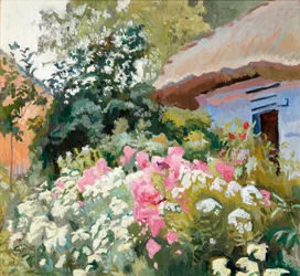 Blumen vor einem Cottage