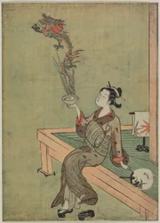 Eine Frau, die mit einem chinesischen Einsiedler verglichen wird, der einen Drachen bändigt