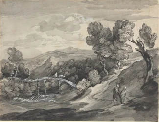Bewaldete Hügellandschaft mit einer Brücke