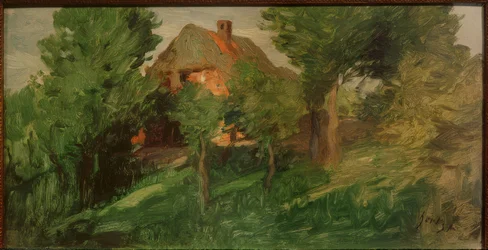 Rotes Haus hinter Bäumen