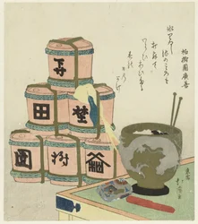 Kohlenbecken und aufgestapelte Sake-Fässer