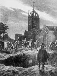 Füllen eines Massengrabs bei Nacht während der Pest von London