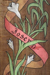 Zeichnung. Blumen und ein Band mit dem Namen Joseph darauf, Fecamp, Frankreich