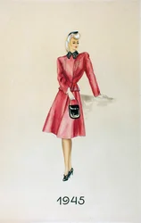 Modell in einem Anzug, eine Handtasche haltend, 1945