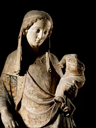 Gotische Kunst: „Jungfrau und Kind“ (Detail). Holzskulptur. 14. Jahrhundert Paris, Louvre Museum