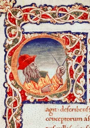 Der griechische Astronom Claudius Ptolemäus (Claudius Ptolemaeus) (um 90-um 168 n. Chr.) verwendet einen Zirkel für Berechnungen. Miniatur aus der „Cosmographia“ (Ms. V.F. 32 f.2r), Neapel, Nationalbibliothek
