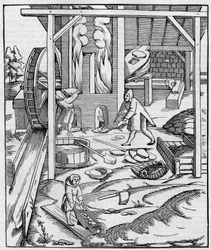 Metallofen-Gebläse betrieben durch einen Hydraulikmotor. Faksimile einer Gravur veröffentlicht in „Cosmographie“ (1555) von Sebastien Munster. Gravur in „La Nature: revue des sciences et de leurs applications aux arts et a l