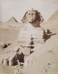 Die Sphinx und im Hintergrund die Große Pyramide von Cheops. Kairo, El Giza