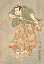 Der Schauspieler Kataoka Nizaemon in zeremoniellen Roben in Grün und Pink